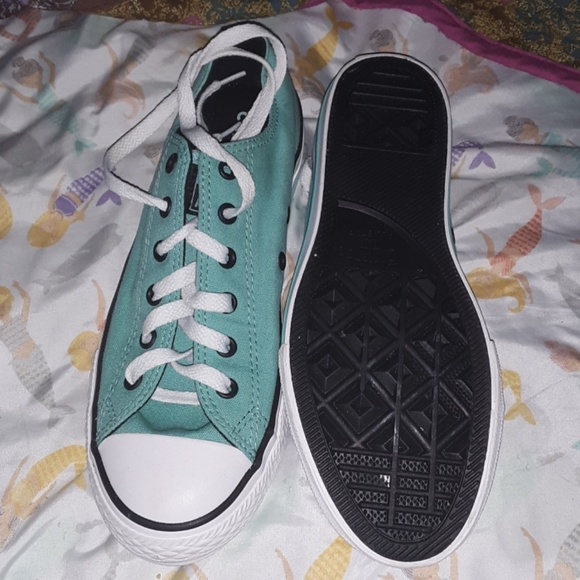 teal colored converse shoes